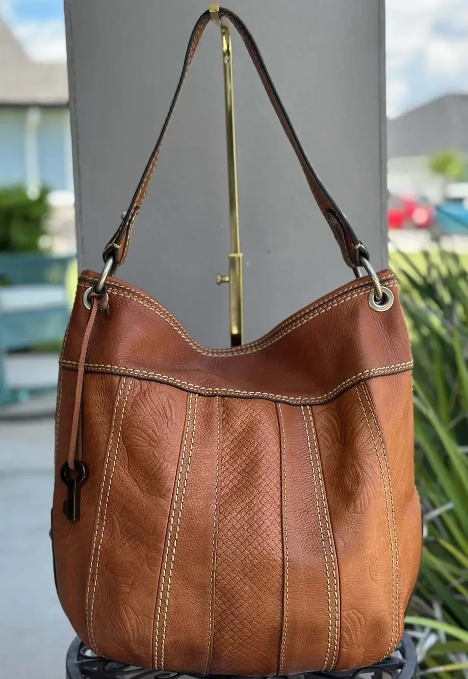 Fossil Brown Leather Hobo Shoulder Bag with Embossed Floral and Textured Details